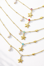 Load image into Gallery viewer, Starfish, heart, Pearl and crystal multi charm necklace