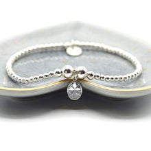 Load image into Gallery viewer, Large oval CZ charm beaded bracelet