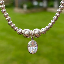 Load image into Gallery viewer, Large oval CZ charm beaded bracelet