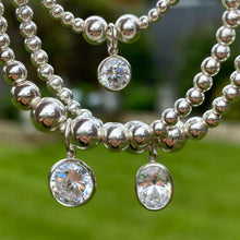 Load image into Gallery viewer, Large oval CZ charm beaded bracelet