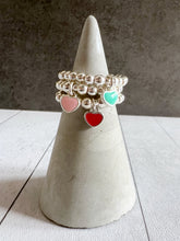 Load image into Gallery viewer, Double Sided Enamel Heart Charm Beaded Stretch Ring