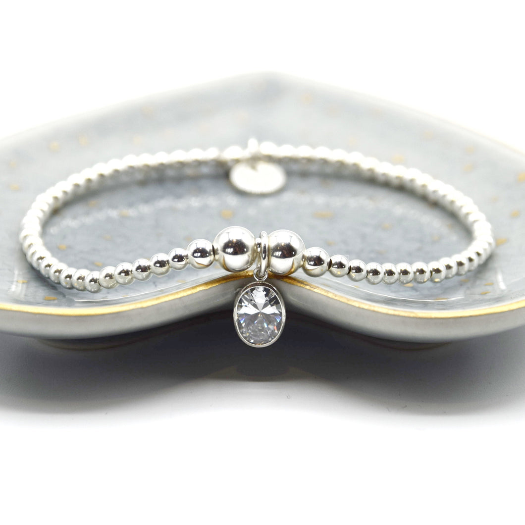 Large oval CZ charm beaded bracelet