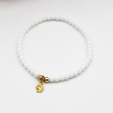 Load image into Gallery viewer, Gold Mini Fossil Charm White Bead Bracelet
