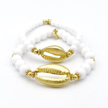 Load image into Gallery viewer, Large Cowrie Shell on white bead bracelet
