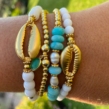 Load image into Gallery viewer, Large Cowrie Shell on white bead bracelet
